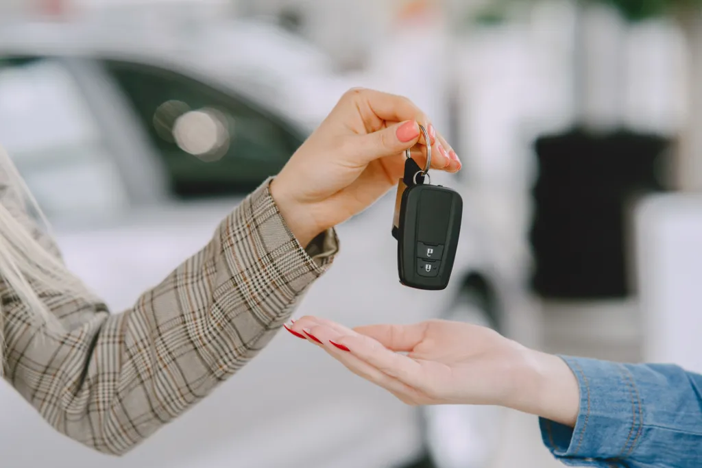 ladies-car-salon-woman-buying-car-elegant-woman-blue-dress-manager-give-keys-client.jpg