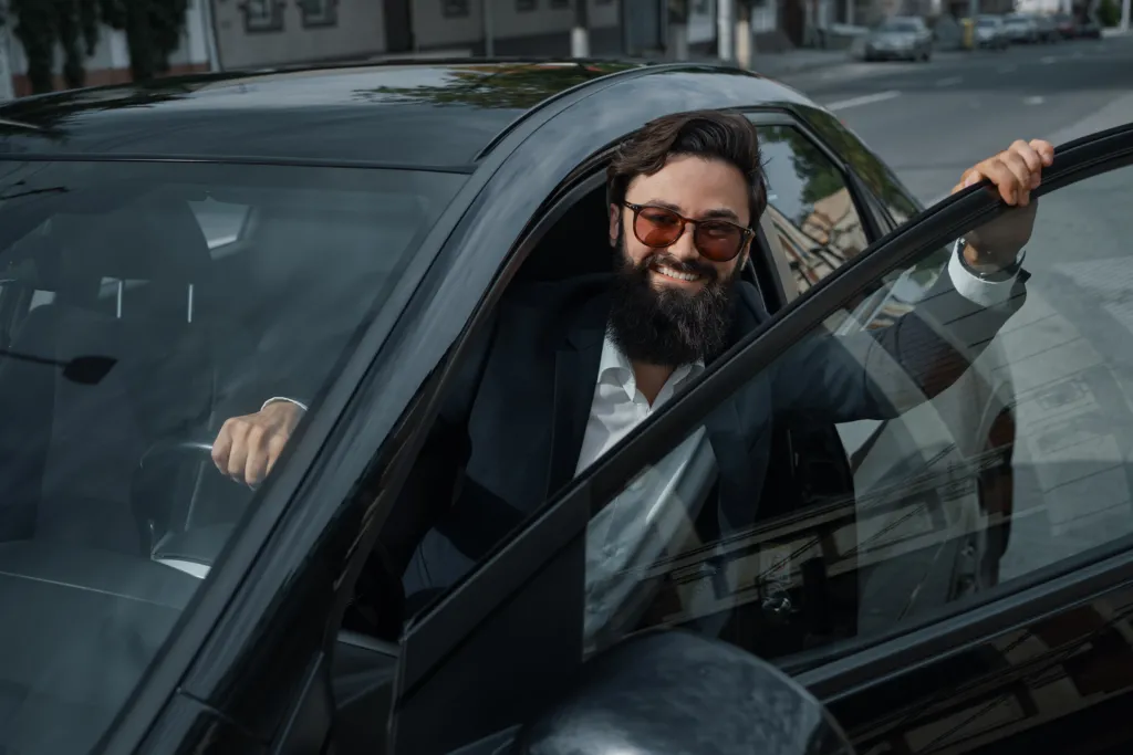 portrait-stylish-handsome-man-near-car-outdoors (1).jpg